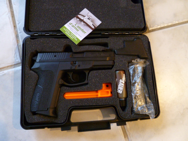Sig Sauer SP2022 cal 9 mm ( état proche du neuf )